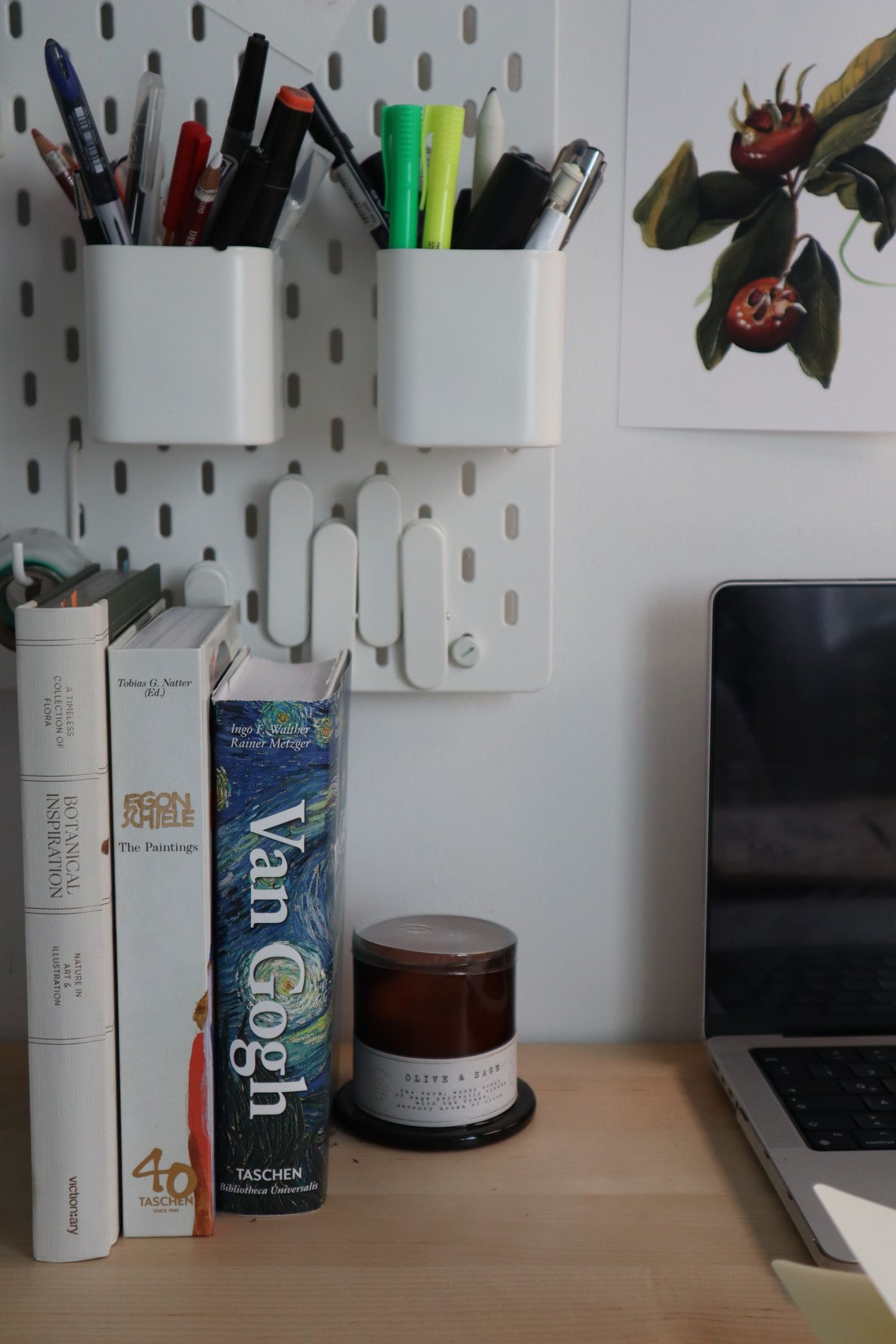 A tidy, organized home office desk with stationery and books, set up for a busy fall season.
